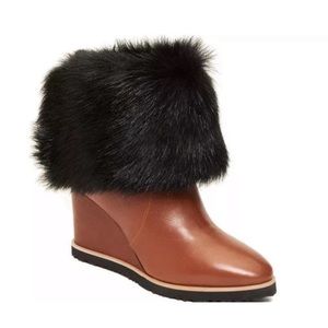 Taryn Rose genuine shearling wedge boots.